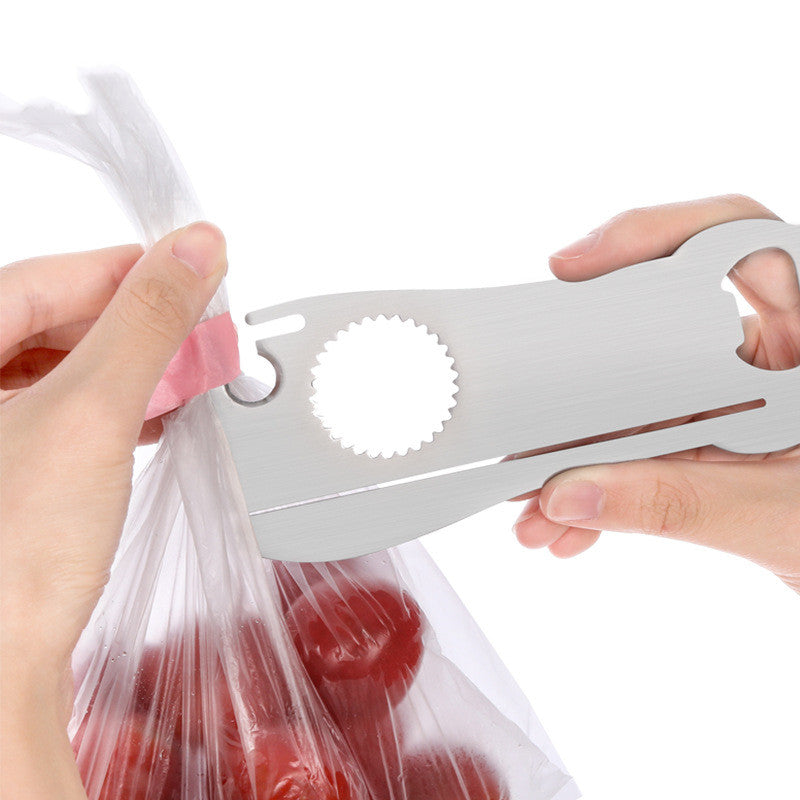 Corkscrew and bottle opener on counter