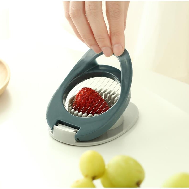 Egg slicer with sliced egg