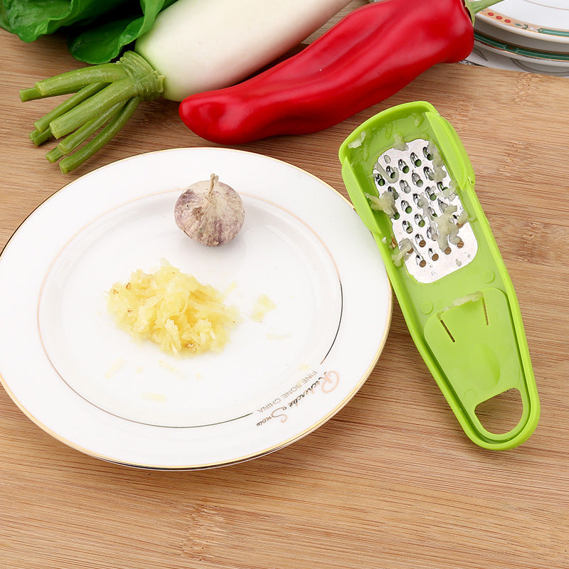 Garlic masher light green