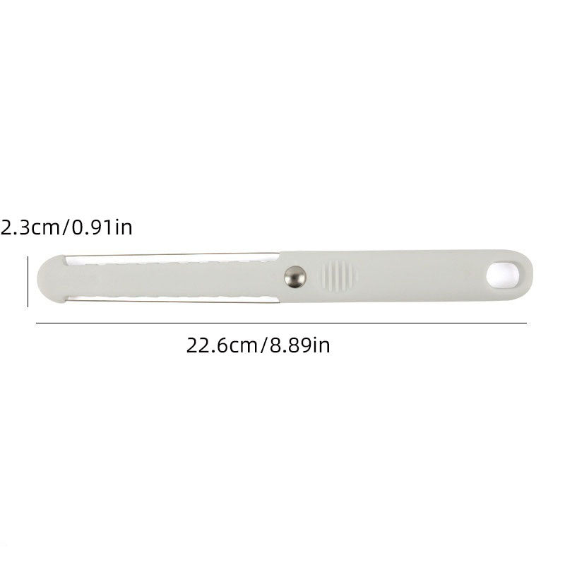 Butter knife spreading cheese