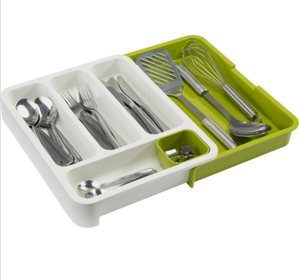 Kitchen drawer organizer holding cutlery